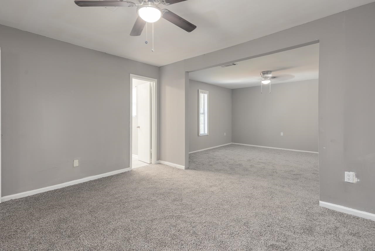 3864 Hobson Road Memphis, TN 38128 - Photo 11 of 19 Spare room with ceiling fan and carpet floors
