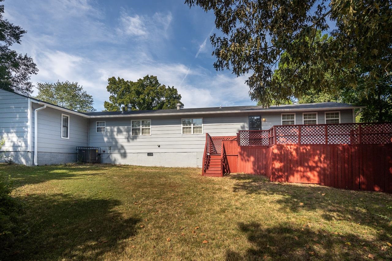 3864 Hobson Road Memphis, TN 38128 - Photo 18 of 19 Rear view of property featuring a lawn and central AC