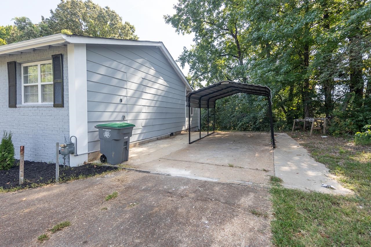 3864 Hobson Road Memphis, TN 38128 - Photo 19 of 19 View of home's exterior featuring a carport