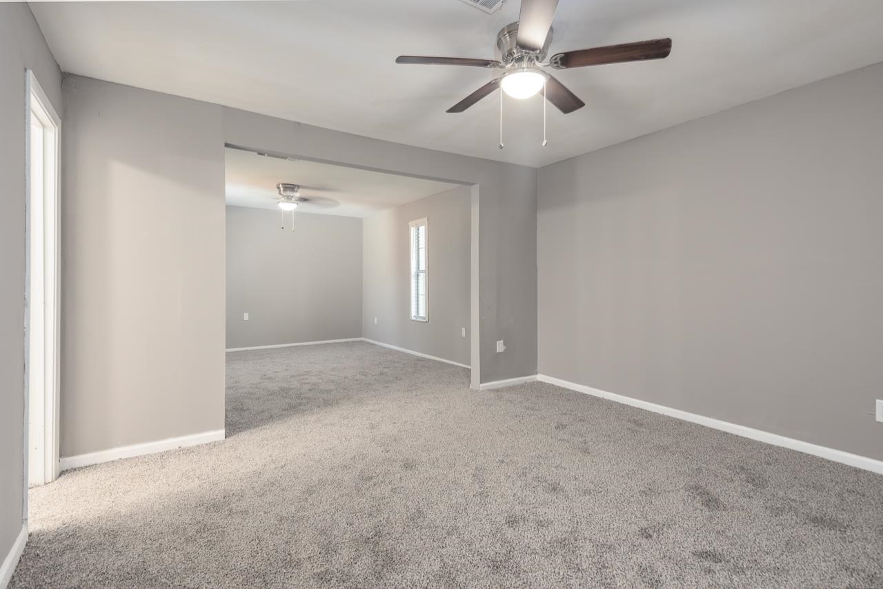 3864 Hobson Road Memphis, TN 38128 - Photo 10 of 19 Carpeted empty room with ceiling fan