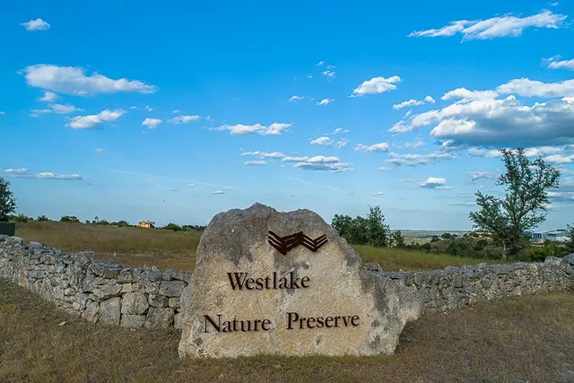 an aerial view of mountain with lake view