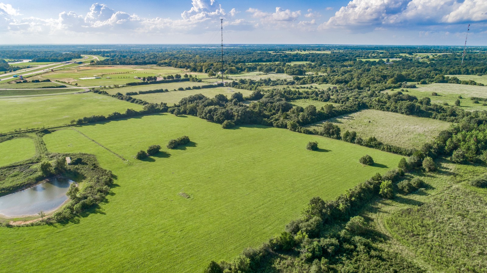 a view of a city with an ocean