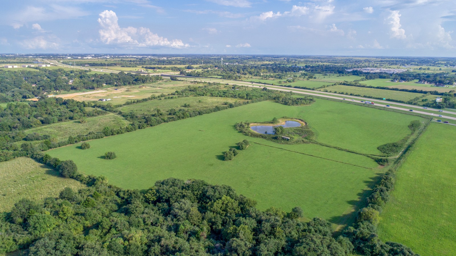 Tbd Richards Road Prairie View, TX 77445 - Photo 8 of 8 a view of a lake with a mountain in the background