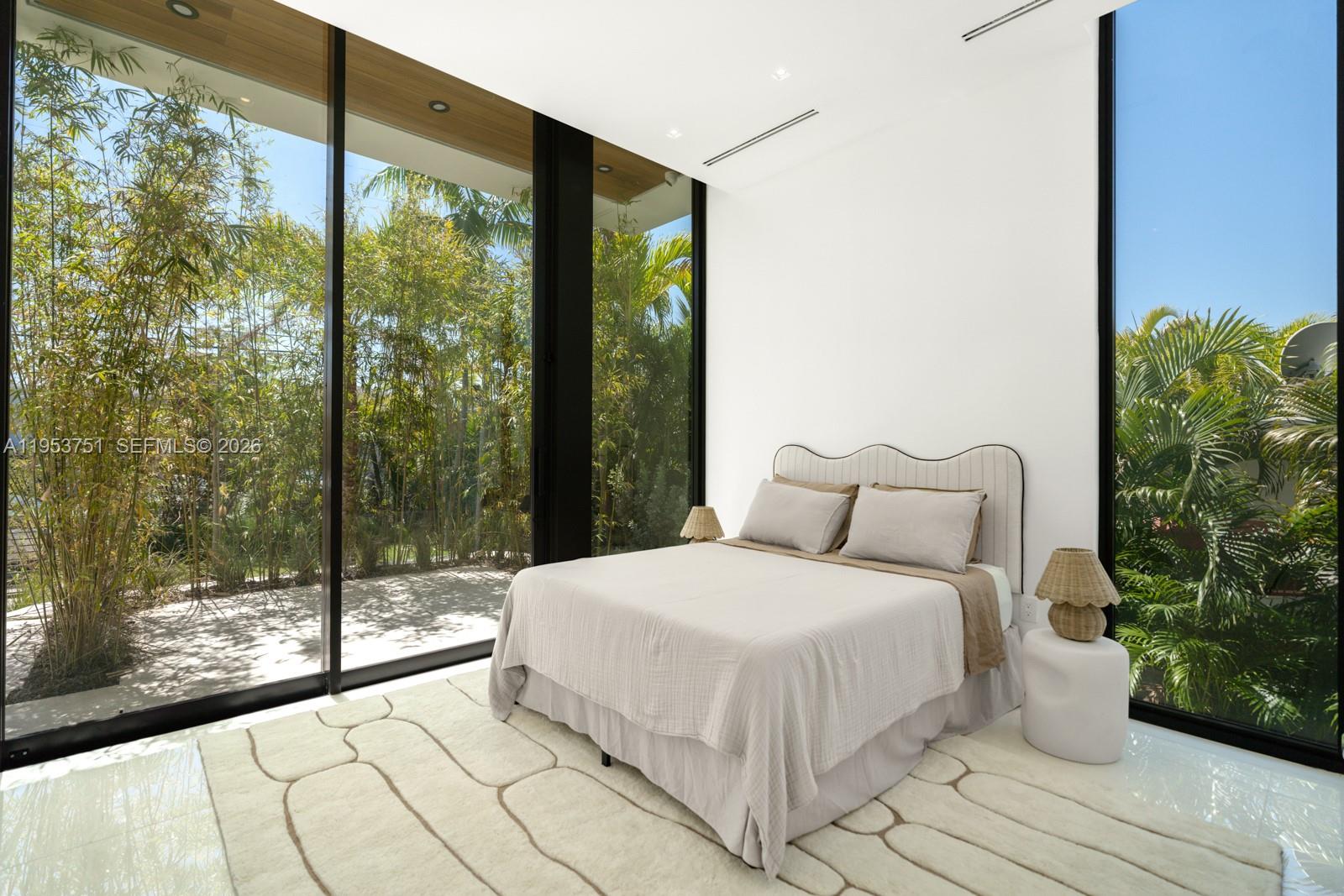 701 86th Street Miami Beach, FL 33141 - Photo 29 of 40 downstairs bedroom