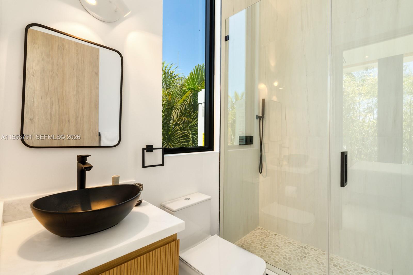 701 86th Street Miami Beach, FL 33141 - Photo 30 of 40 downstairs bathroom