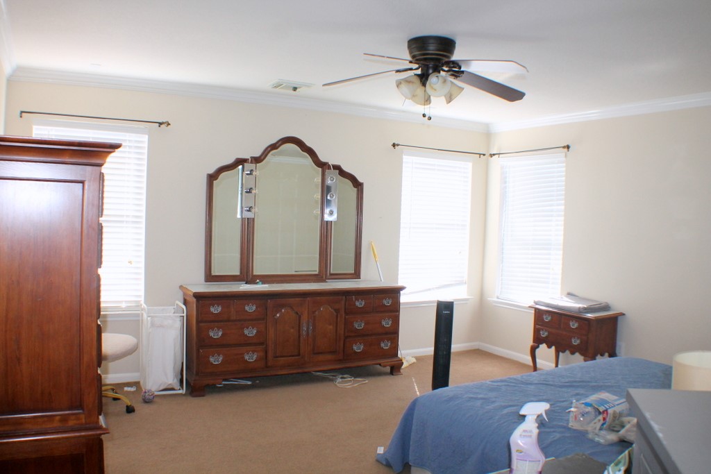 7910 Autumn Fall Street Baytown, TX 77523 - Photo 9 of 23 a living room with furniture and a mirror