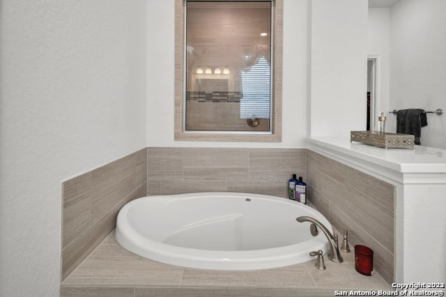 3782 Chicory Bend Bulverde, TX 78163 - Photo 22 of 41 a bathroom with a sink and a mirror