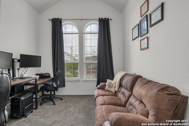 3782 Chicory Bend Bulverde, TX 78163 - Photo 25 of 41 a living room with furniture and a window