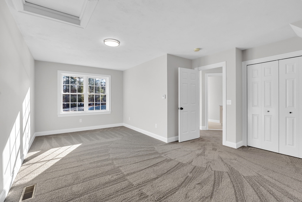 116 Townsend Harbor Road Lunenburg, MA 01462 - Photo 20 of 30 wooden floor in an empty room with a window
