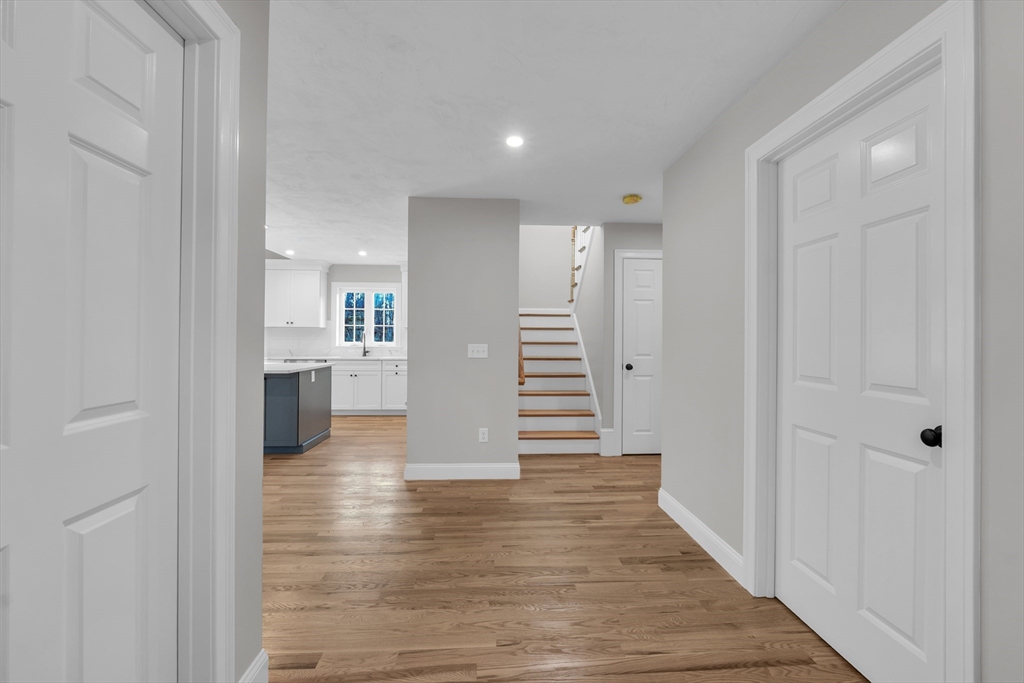 116 Townsend Harbor Road Lunenburg, MA 01462 - Photo 5 of 30 a view of a kitchen with wooden floor and a sink