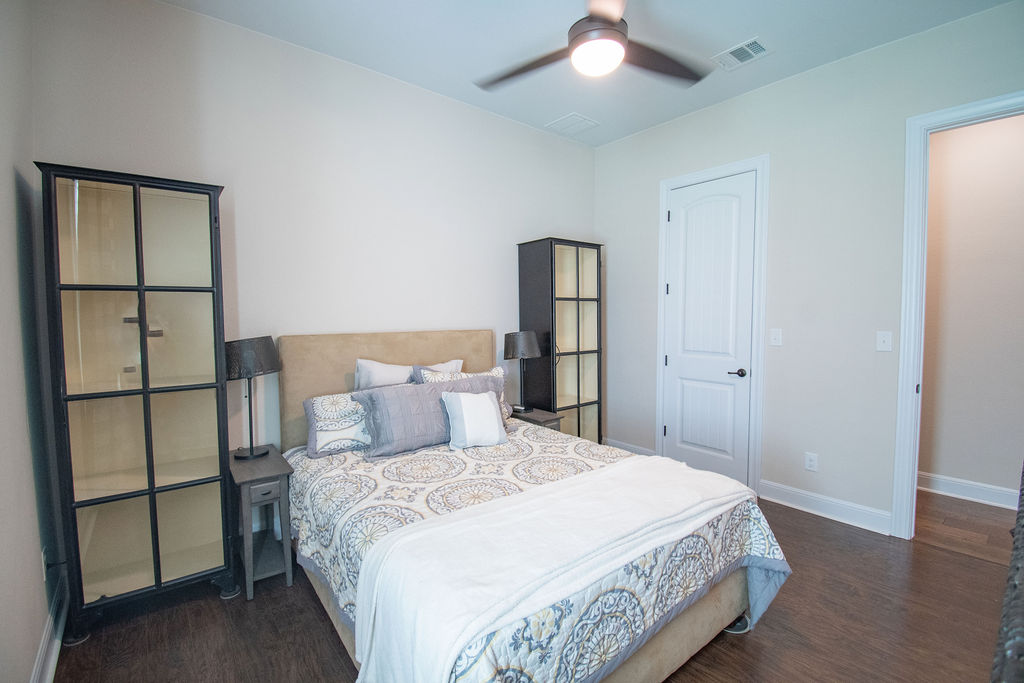 Undisclosed Address Georgetown, TX 78633 - Photo 18 of 39 a bedroom with a bed and a window