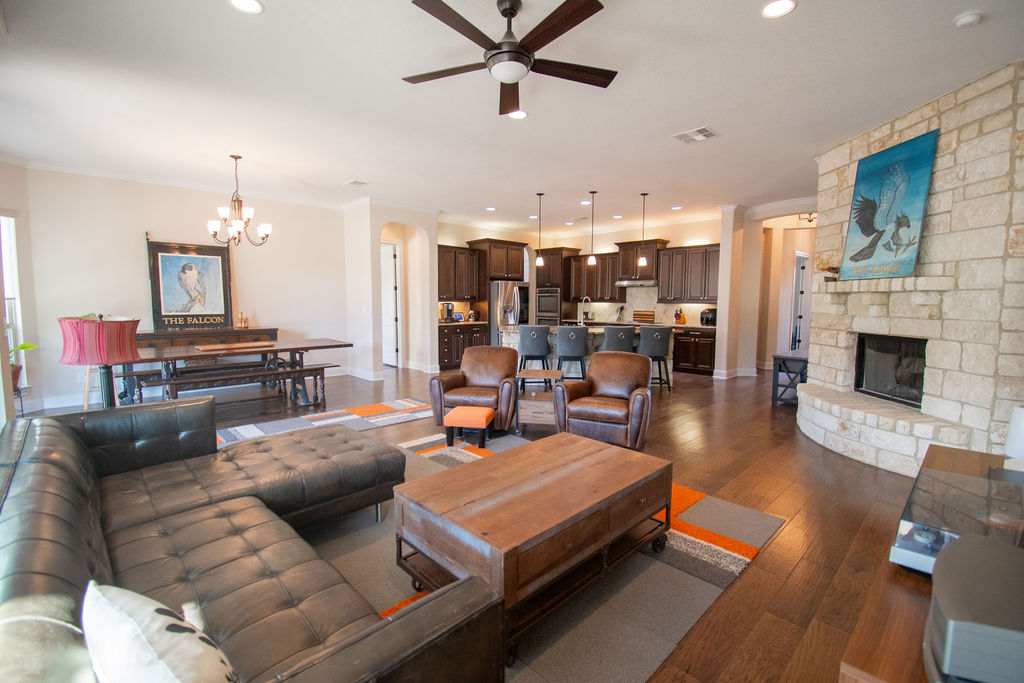 Undisclosed Address Georgetown, TX 78633 - Photo 2 of 39 a living room with furniture and a fireplace