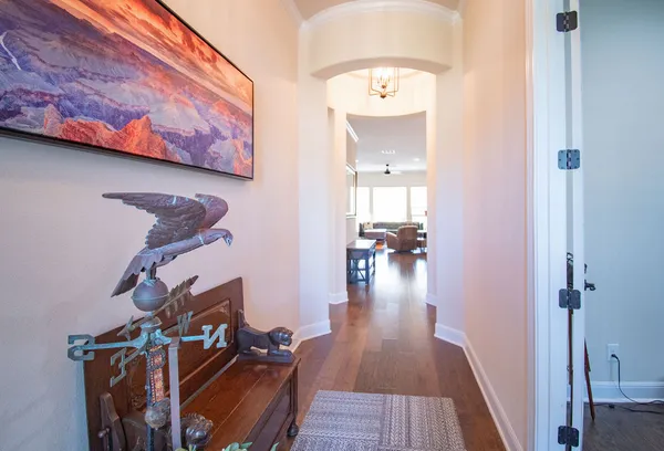 a view of entryway with wooden floor