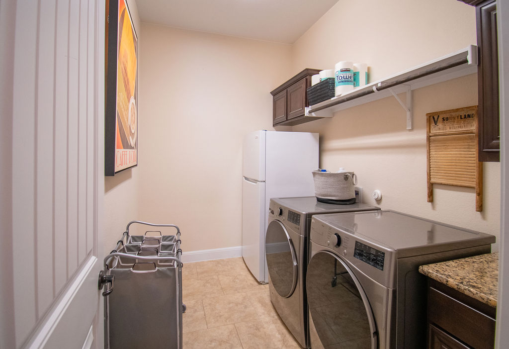 Undisclosed Address Georgetown, TX 78633 - Photo 25 of 39 a utility room with dryer and washer