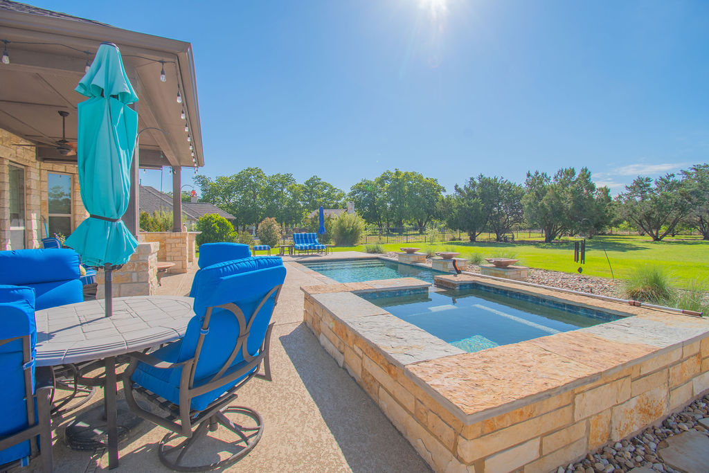 Undisclosed Address Georgetown, TX 78633 - Photo 27 of 39 a view of outdoor space yard swimming pool and patio