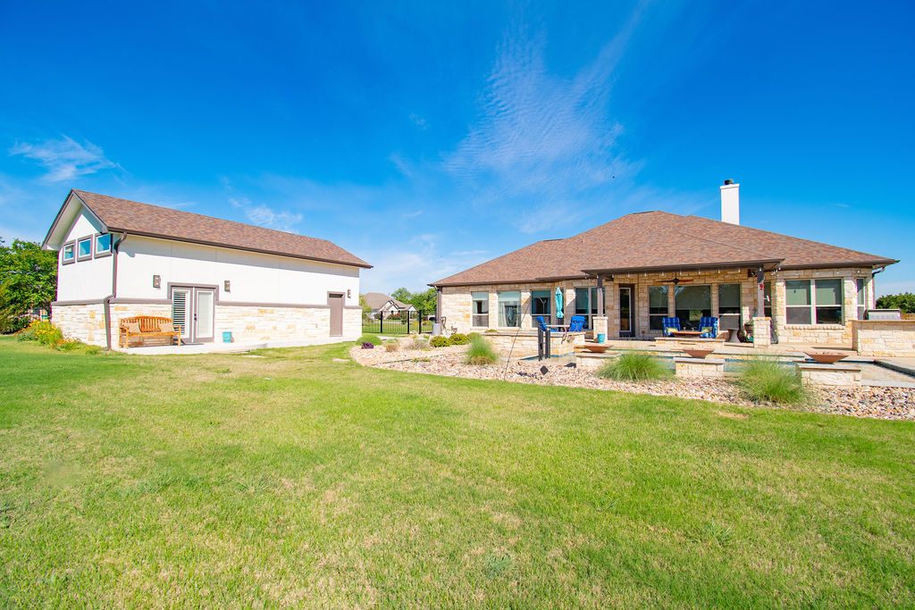 Undisclosed Address Georgetown, TX 78633 - Photo 37 of 39 a front view of house with yard and seating area