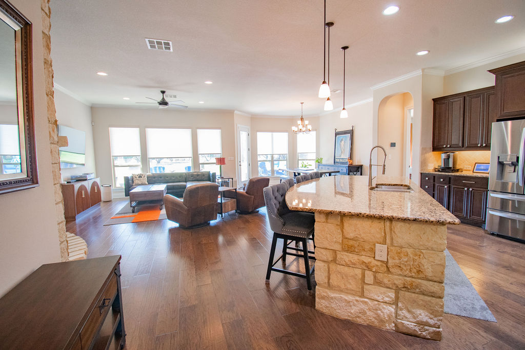 Undisclosed Address Georgetown, TX 78633 - Photo 7 of 39 a large kitchen with a table and chairs