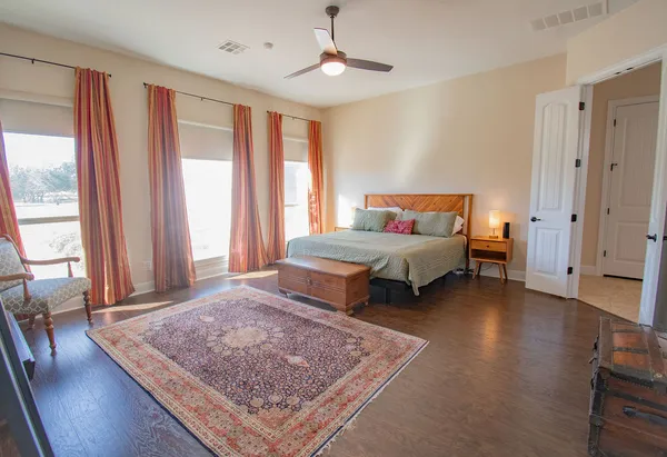 a living room with furniture and a rug