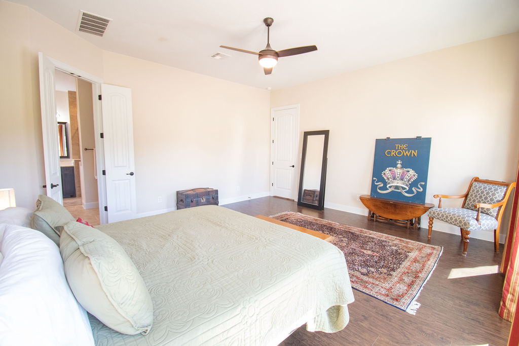 Undisclosed Address Georgetown, TX 78633 - Photo 9 of 39 a bedroom with a bed and dresser