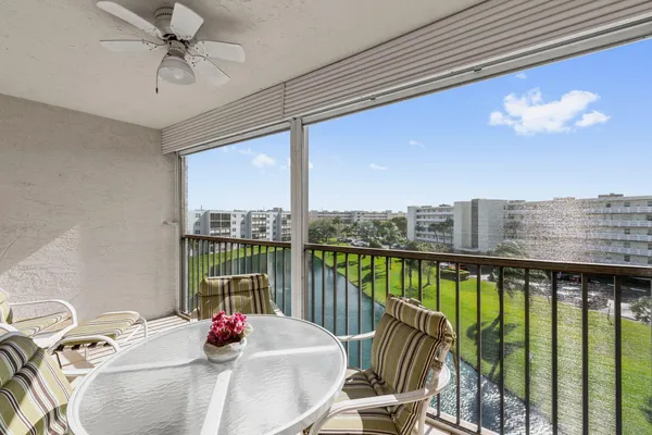 a view of a balcony dining area