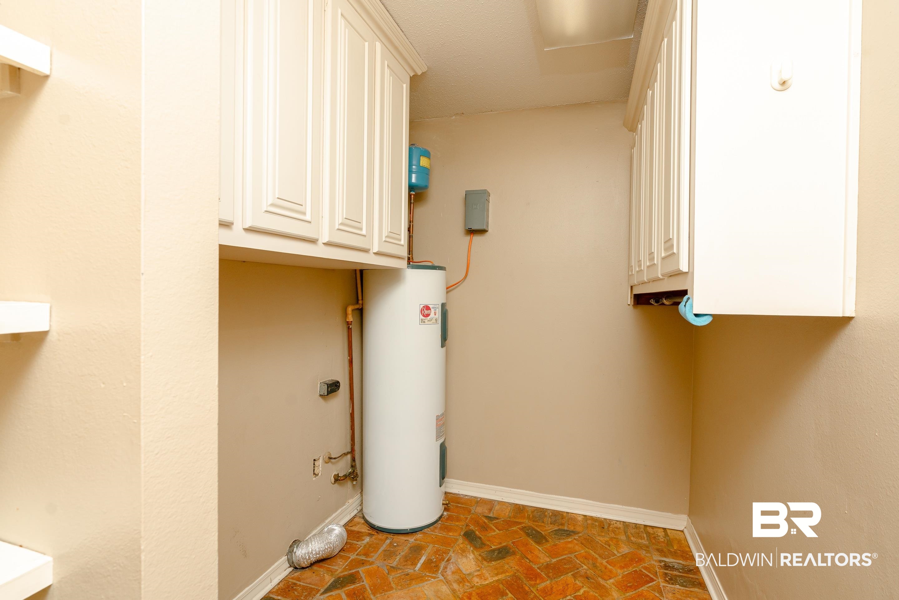 23 Old Mill Court Mobile, AL 36608 - Photo 17 of 37 Clothes washing area featuring water heater