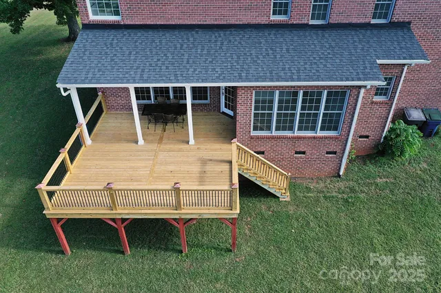 a view of a terrace with trees