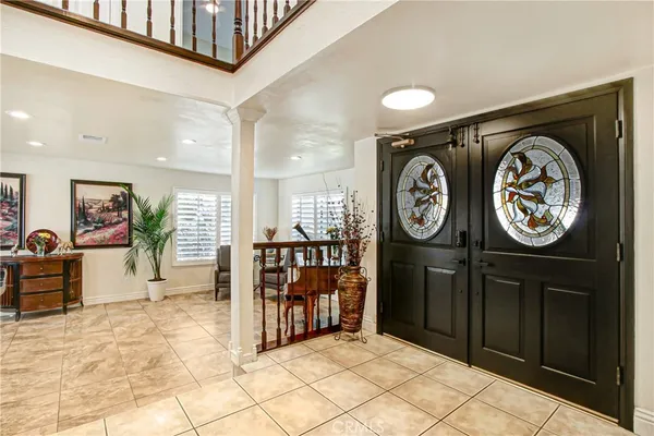 a view of a hallway with entryway