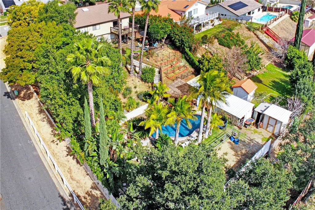 9111 Hidden Farm Road Alta Loma, CA 91737 - Photo 42 of 45 an aerial view of residential houses with yard