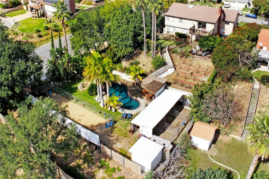 9111 Hidden Farm Road Alta Loma, CA 91737 - Photo 45 of 45 an aerial view of a house with a yard