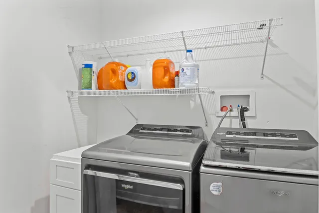 a bathroom with a bathtub a sink and a shower