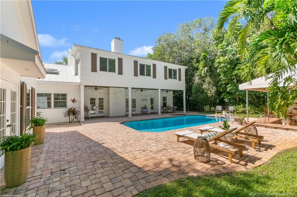 16 Ridgeview Road North Sewall's Point, FL 34996 - Photo 2 of 88 a view of a house with backyard and sitting area
