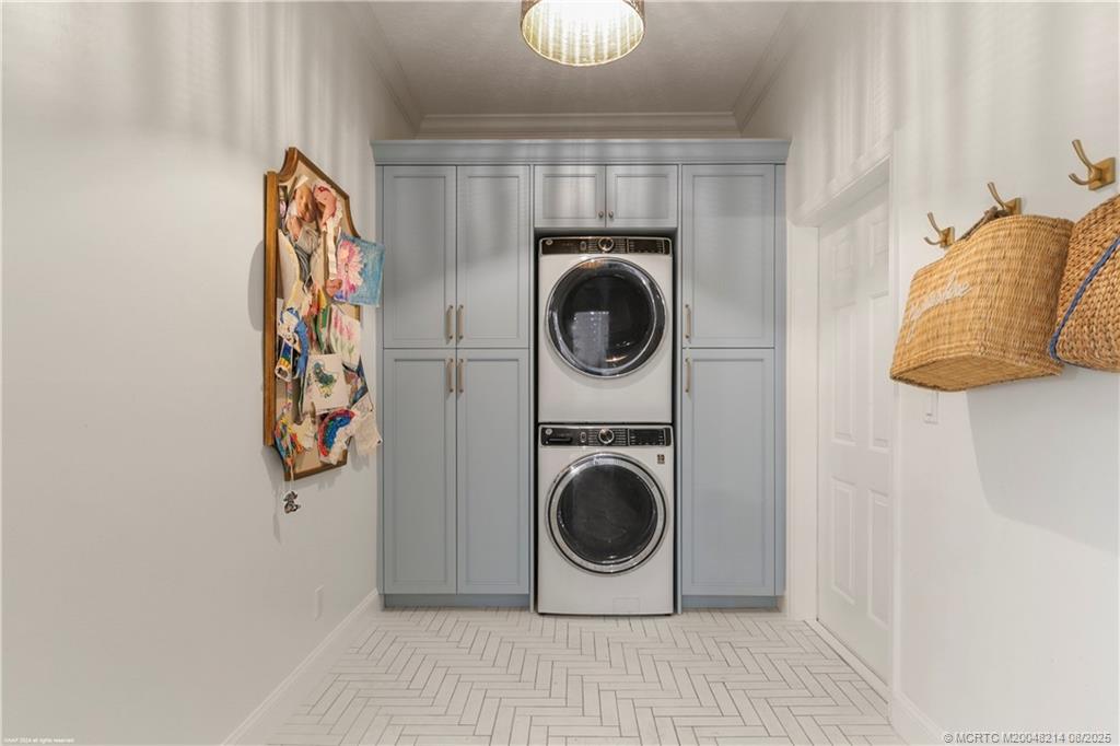 16 Ridgeview Road North Sewall's Point, FL 34996 - Photo 69 of 88 a utility room with dryer and washer