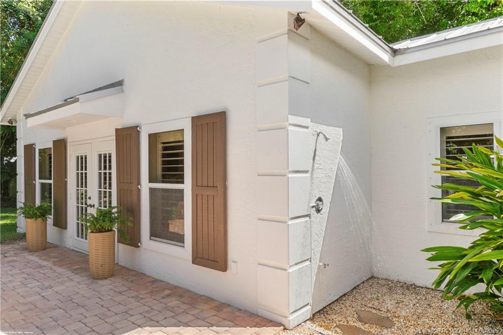 16 Ridgeview Road North Sewall's Point, FL 34996 - Photo 72 of 88 a view of a entryway of the house