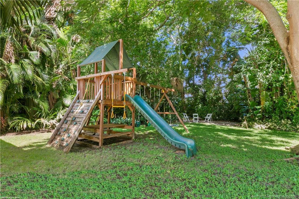 16 Ridgeview Road North Sewall's Point, FL 34996 - Photo 87 of 88 a view of a house with a park