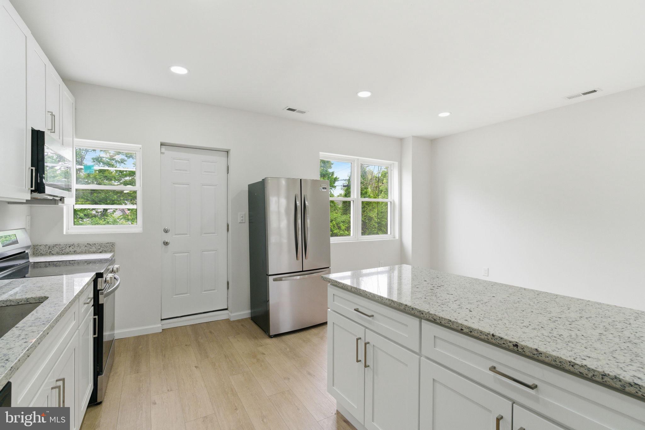 4111 Roland View Avenue Baltimore, MD 21215 - Photo 3 of 19 Bright and airy modern kitchen space.