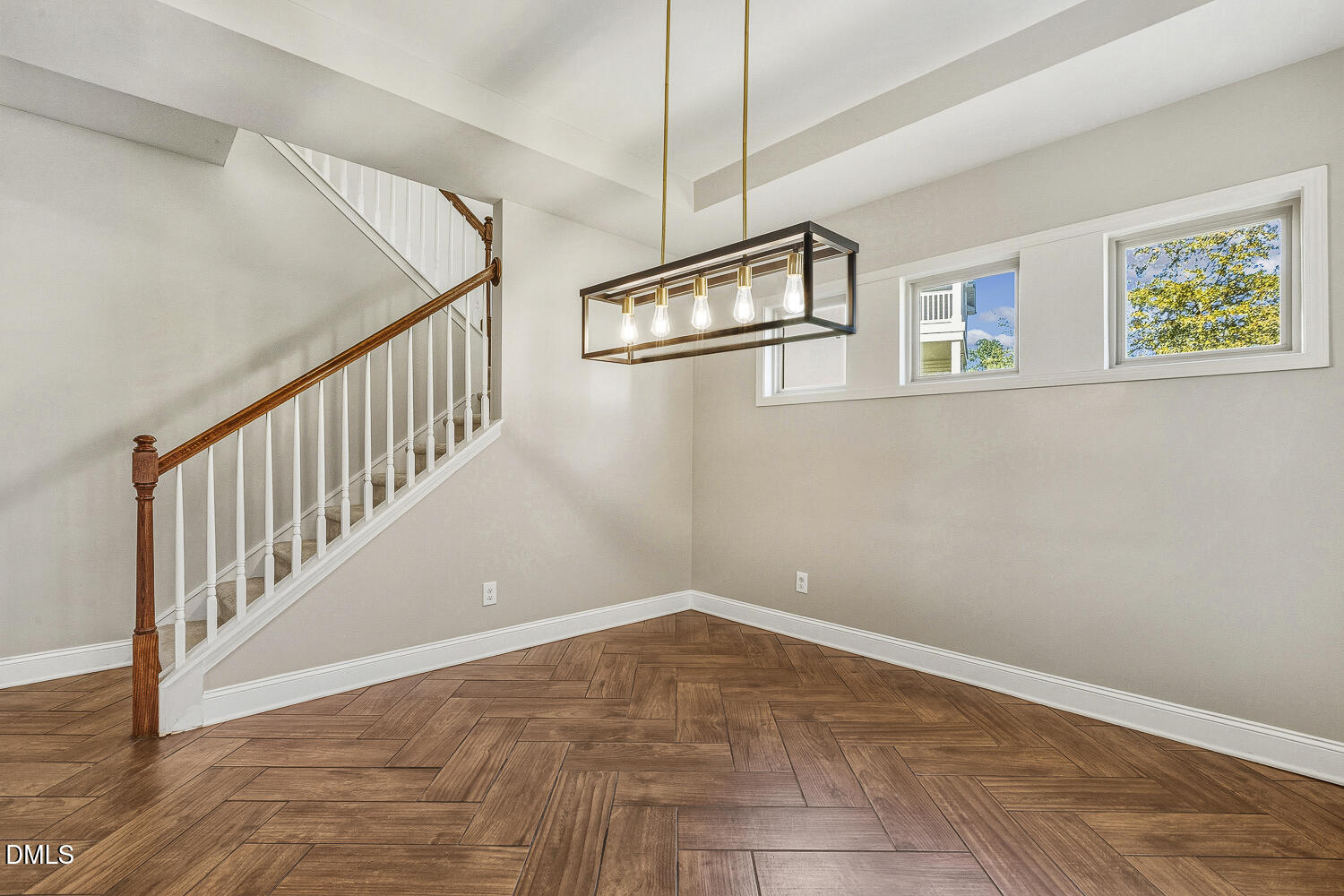 1008 Poplar Street Durham, NC 27703 - Photo 11 of 73 a view of an empty room with wooden floor