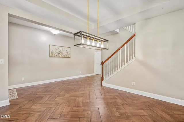 a kitchen with a stove and a refrigerator