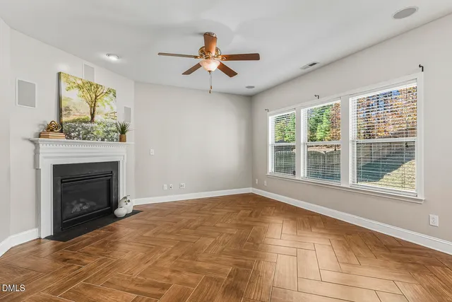 a bathroom with a double vanity sink mirror and shower
