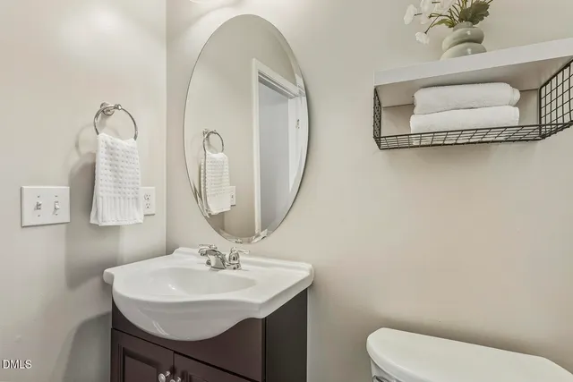 a living room with furniture window and a flat screen tv