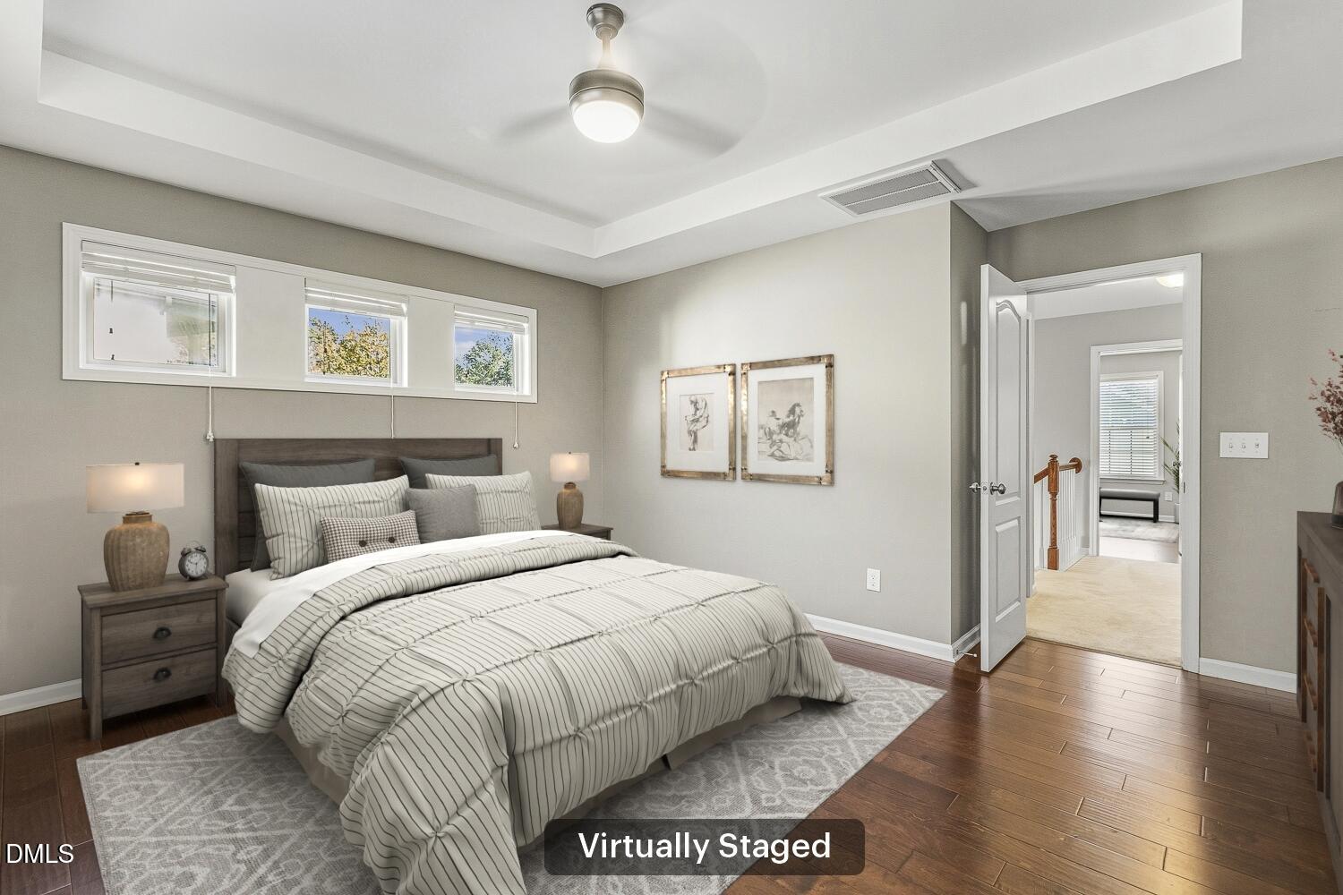 1008 Poplar Street Durham, NC 27703 - Photo 38 of 73 a bedroom with a bed and a painting on the wall
