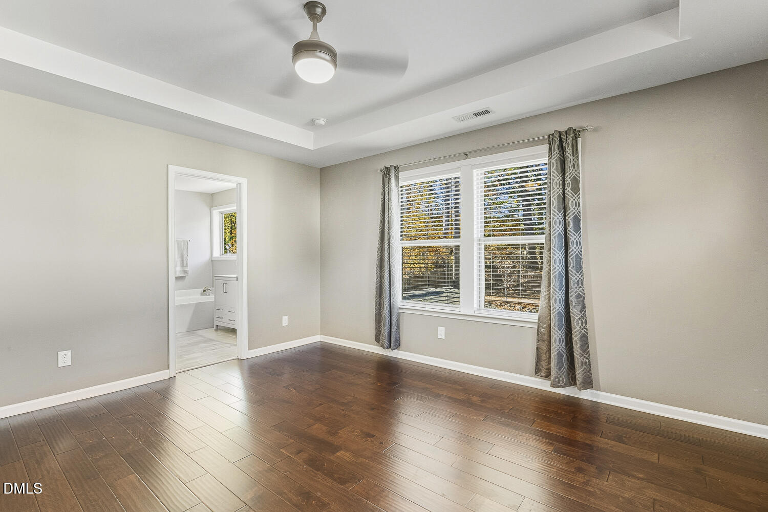 1008 Poplar Street Durham, NC 27703 - Photo 42 of 73 an empty room with wooden floor and windows