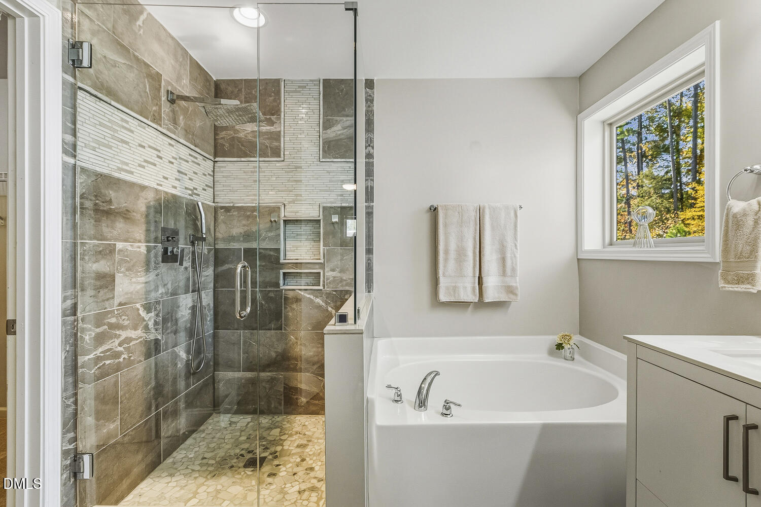 1008 Poplar Street Durham, NC 27703 - Photo 45 of 73 a bathroom with a bathtub and shower