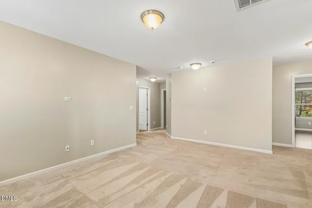 a view of a back yard from a balcony