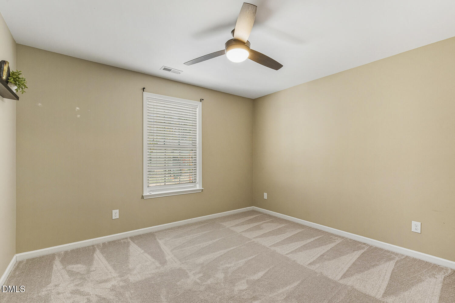 1008 Poplar Street Durham, NC 27703 - Photo 57 of 73 a view of an empty room with a window