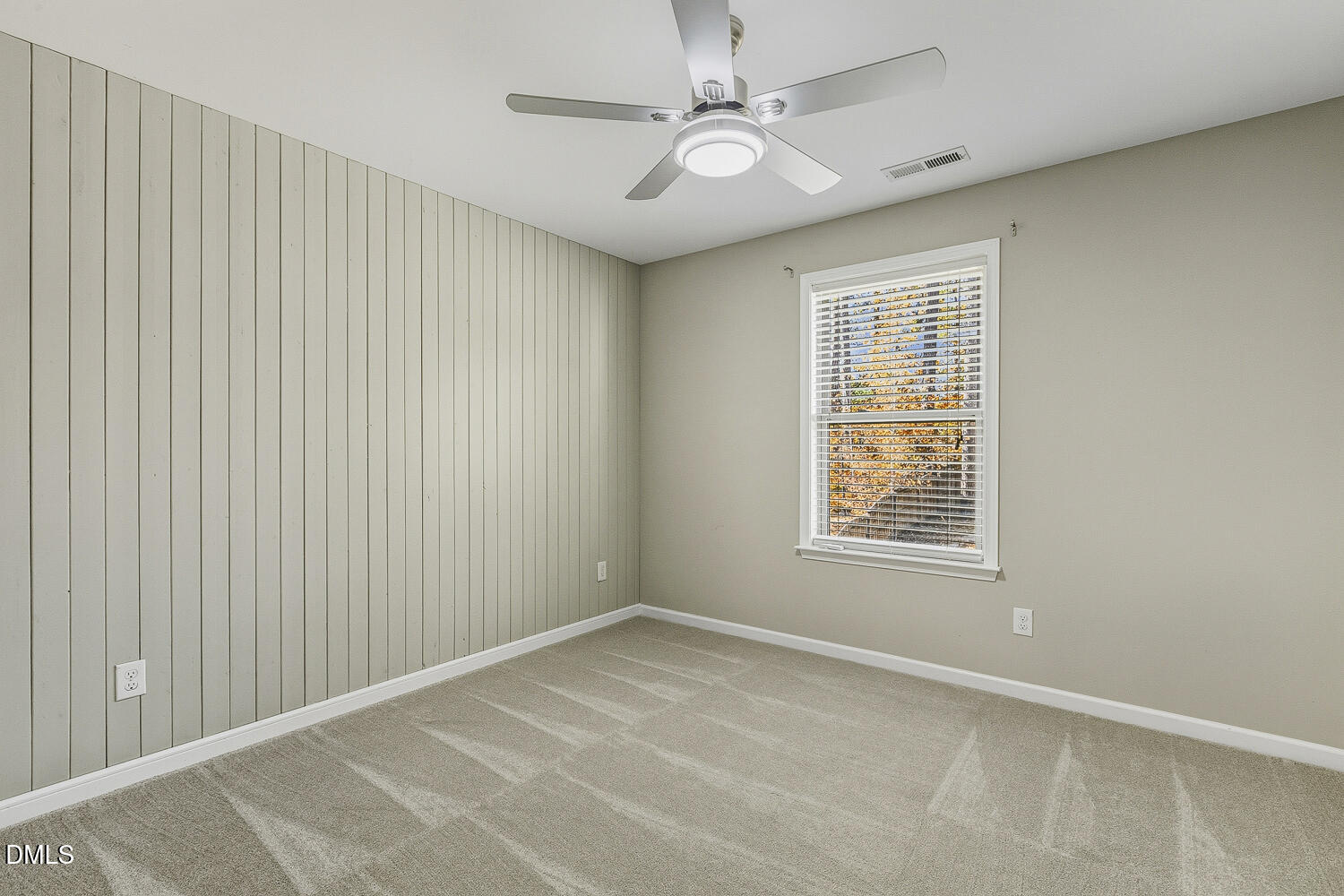 1008 Poplar Street Durham, NC 27703 - Photo 60 of 73 an empty room with windows and fan