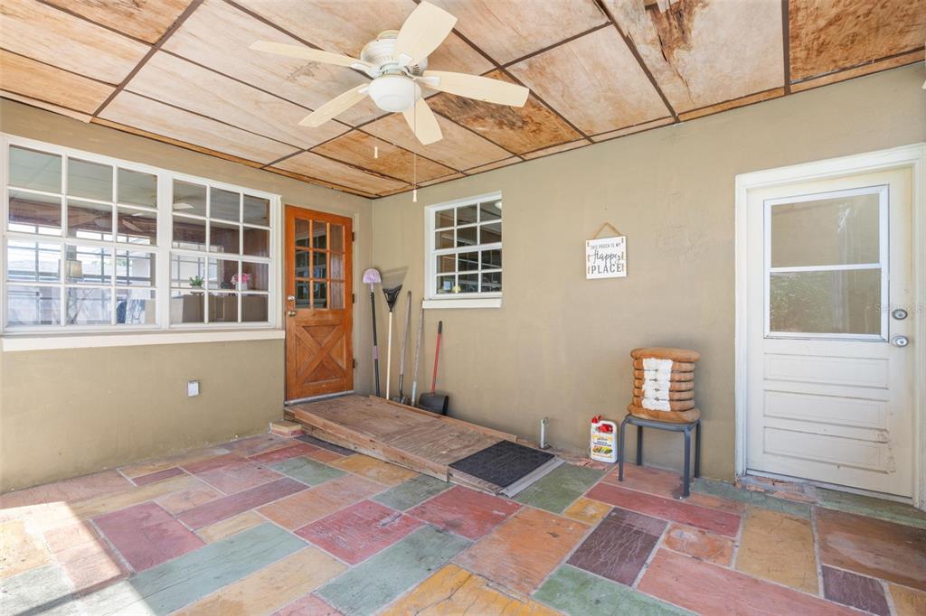 909 Woodley Road Clearwater, FL 33764 - Photo 20 of 29 a bedroom with a bed and a window
