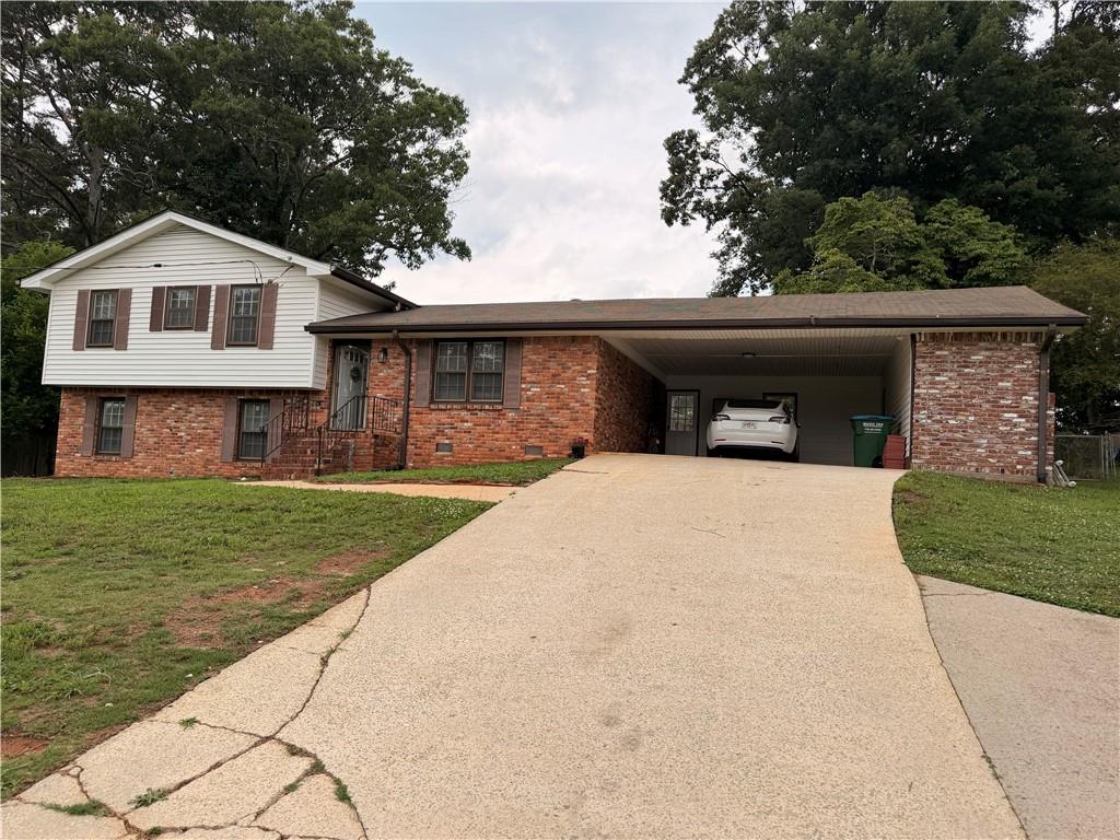 886 Killian Hill Road Southwest Lilburn, GA 30047 - Photo 1 of 12