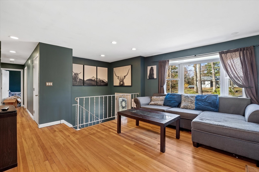 47 Shepard Road Sturbridge, MA 01566 - Photo 6 of 24 a living room with furniture and a large window