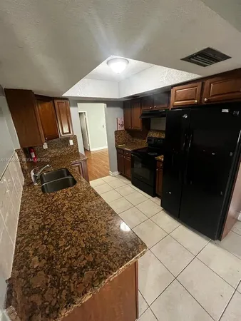 $4,942 | 4753 Northwest 41st Street, Lauderdale Lakes, FL 33319