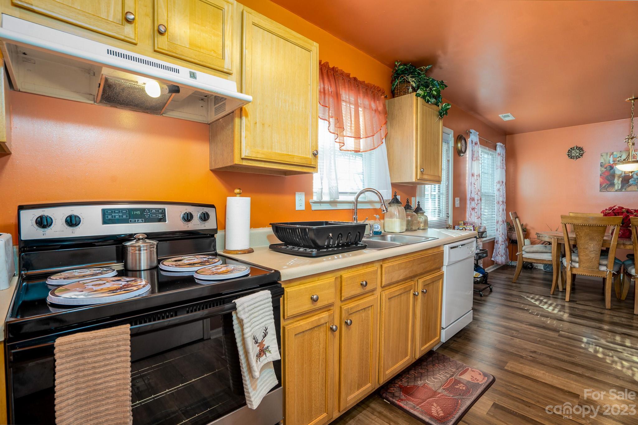 907 McDonald Road Charlotte, NC 28214 - Photo 13 of 28 a kitchen with stainless steel appliances granite countertop a stove a sink and a cabinets